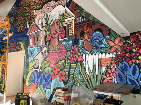 Cafe dengan sentuhan seni street art pada dindingnya yang menciptakan kesan artistik